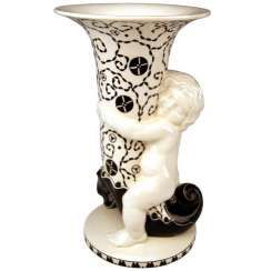 MICHAEL POWOLNY PUTTO WITH CORNUCOPIA VASE