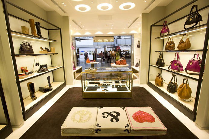 Internal shot from in store of the various different retail displays used to display and present the handbags from premium brand Mulberry.