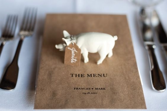 Spray paint plastic animal figures and use as place cards. #menu #pig #food