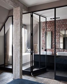 Bookofinteriors - Wall bricked bathroom