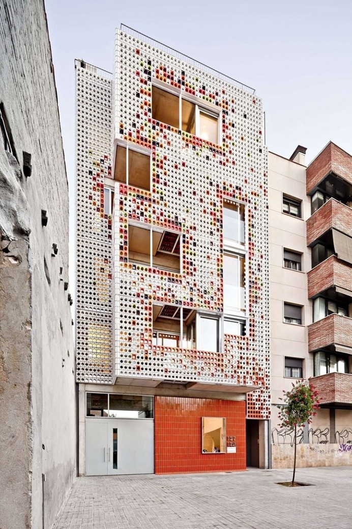 A Facade Of Colorful Ceramic Blocks Cover This Apartment Building #inspiration #apartment #colorful #architecture