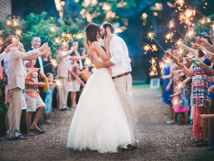 Simple wedding dresses are perfect for modest brides. Such dresses don’t have any embellishments and hand-beaded details.