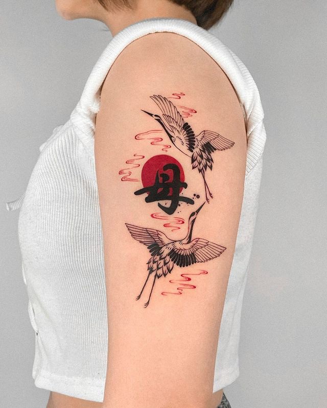Two #cranes sleeve #tattoo with clouds and #sun and a Chinese word mother