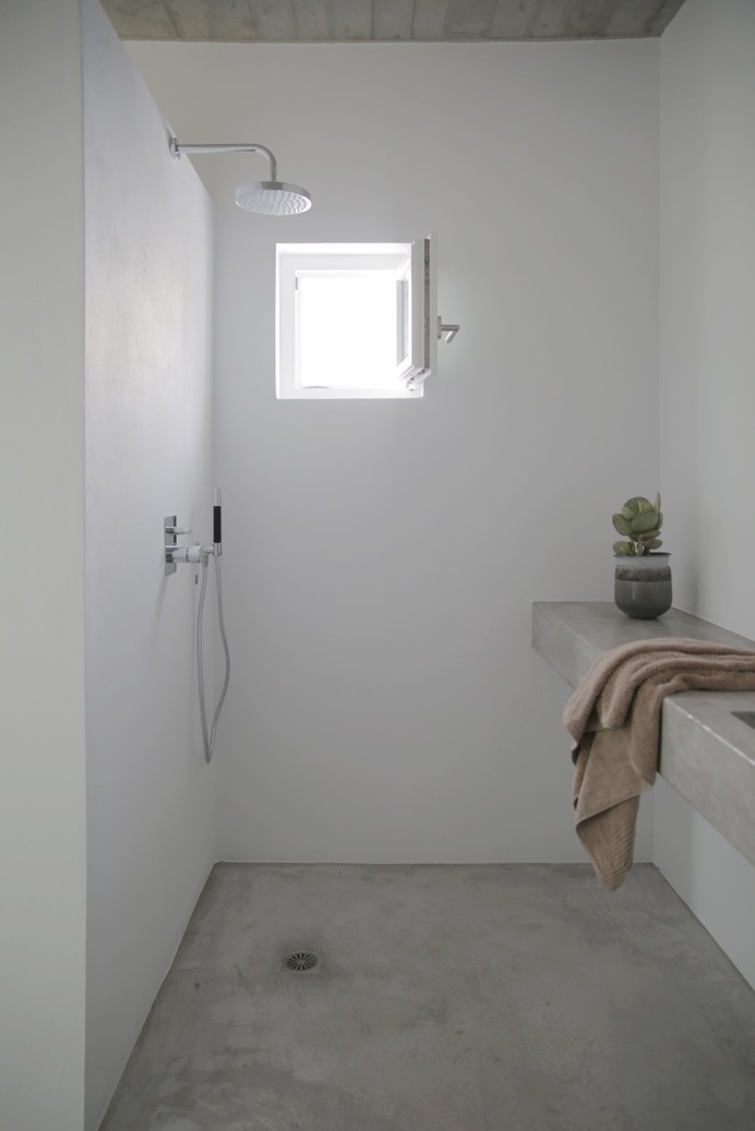 #Shower with #concreteceiling, floor and #countertop. #MaisonKamari. #concretefloor #concretecountertop