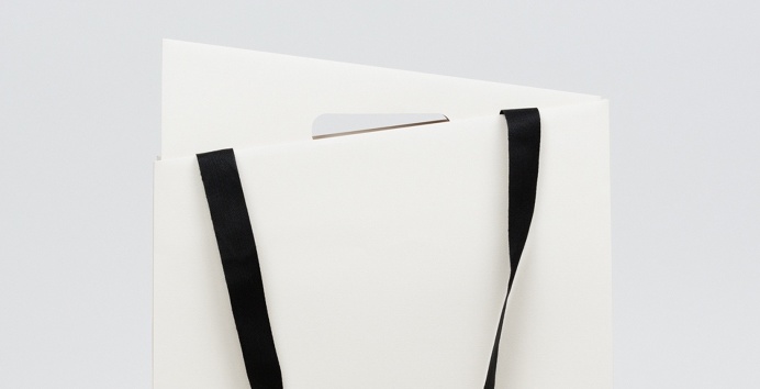 Wadha Doha Branding corporate design white black deluxe luxury minimal logo logotype Shopping Bag Two Times Elliott www.mindsparklemag.com