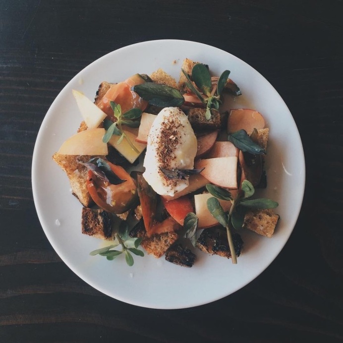 White peach and heirloom tomato panzanella with burrata za'atar, basil, and sherry