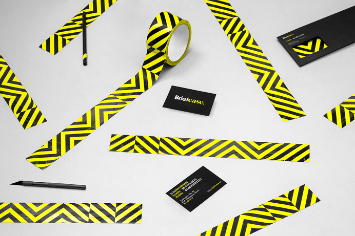 Briefcase branding by anagrama moterey mexico mindsparkle mag business card corporate design stationery minimal yellow geometry black tape l