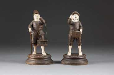 TWO FIGURES: BIRD AND FISH SELLER (IN THE STYLE OF SIMON TRÖGER)
