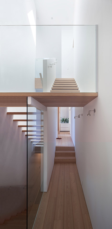 East Van House by Splyce Design features an asymmetric sloping roof