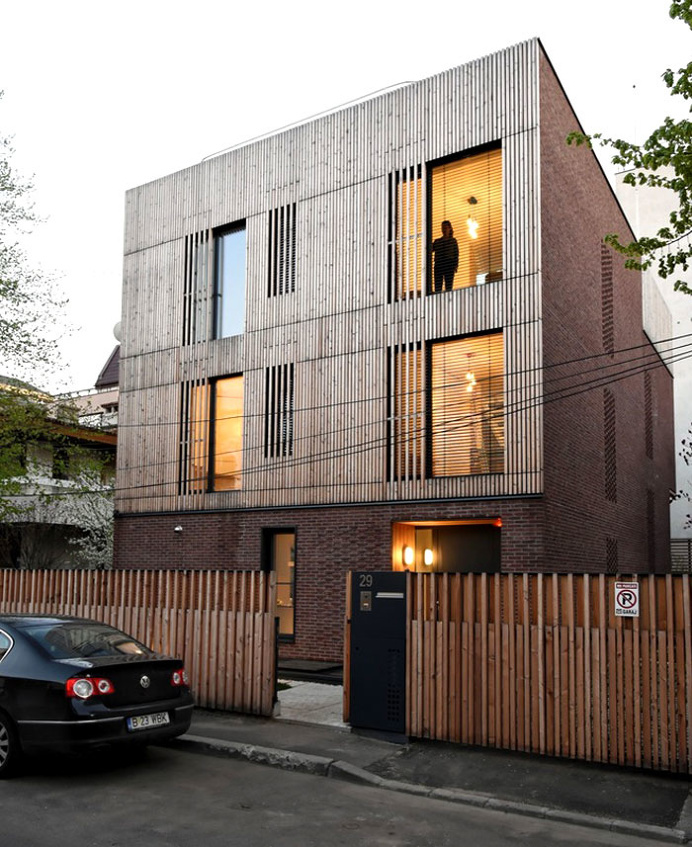 Spectacular Play of Volumes and Materials into Modern Split Level House - InteriorZine