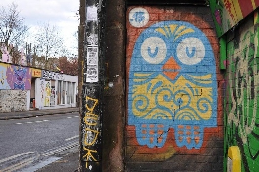 45RPM | Owl design on wall | Facade street art from Stokes Croft #mural #painting