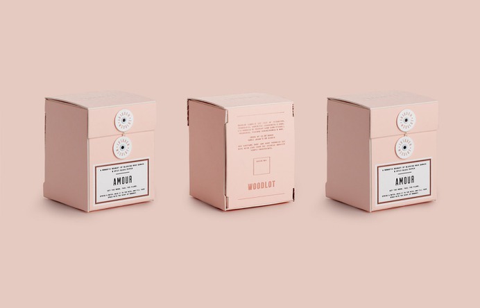 Woodlot Amour Candle Box Packaging - Mindsparkle Mag arithmetic designed Woodlot Amour Candle Box Packaging. The Amour collection was inspired by the qualities brought forth from pink gemstones; believed to bring about serenity, relaxation, acceptance, and contentment, and even soften frustration. #logo #packaging #identity #branding #design #color #photography #graphic #design #gallery #blog #project #mindsparkle #mag #beautiful #portfolio #designer