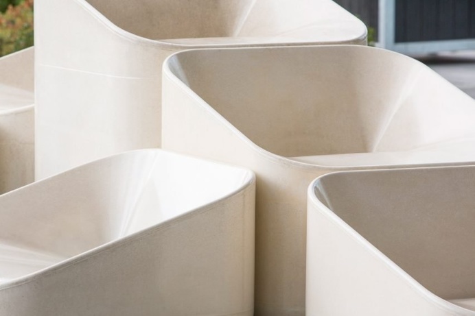 Raw Edges creates concrete armchairs for Greenwich Peninsula