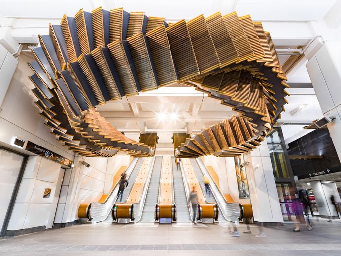 80-Year-Old Wooden Escalators are Repurposed as a Sculptural Ribbon by Artist Chris Fox | Colossal