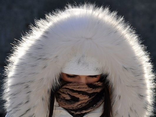 Cold snap paralyzes Europe Photos | Cold snap paralyzes Europe Pictures - Yahoo! News #fur #hat #white #winter