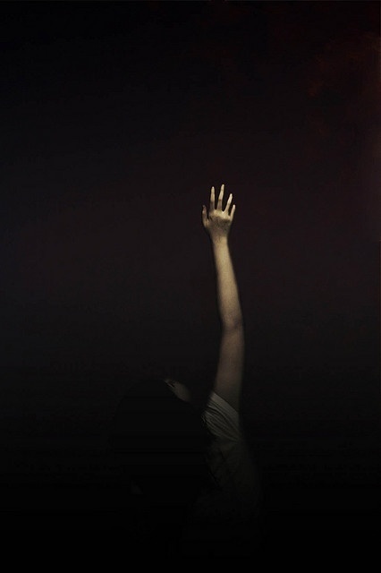 reaching hand arm
