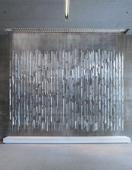 Donor recognition signage appears as a sculptural installation in the building's lobby. #lobby #recognition #installation #signage #appears #donor #sculptural #buildings