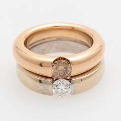 Ladies ring made of 2 solitaire rings with 2 diamonds