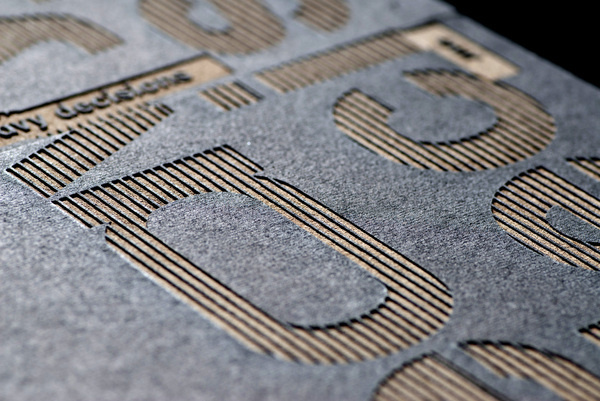 Laser engraved cardboard. Lith facing heavy decisions by Nico Bats, Tobias Gebert and Sebastian Zimmerhackl #concrete #laser #black #engraving #slipcase #editorial #heavy