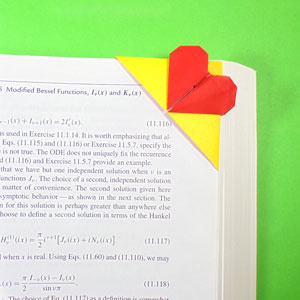 How to make a top-corner heart origami bookmark (http://www.origami-make.org/howto-origami-bookmark.php)