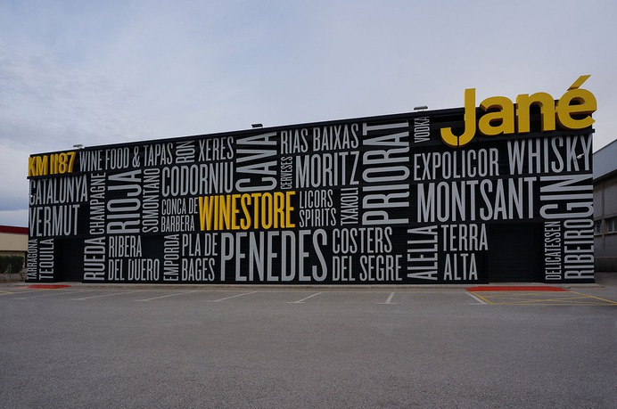 Typographic signage for a liquor store - Mindsparkle Mag Pablo Rovalo from Singular Glass designed the typographic signage and placemaking project for Jané Winestore Expo-Licor, a liquor store in Barcelona. #logo #typography #identity #branding #design #color #photography #graphic #design #gallery #blog #project #mindsparkle #mag #beautiful #portfolio #designer