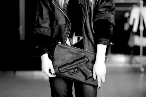 High heels and hangovers. #clutch #gun