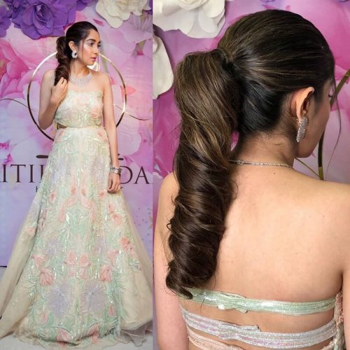Slicked Back Curly Ponytail