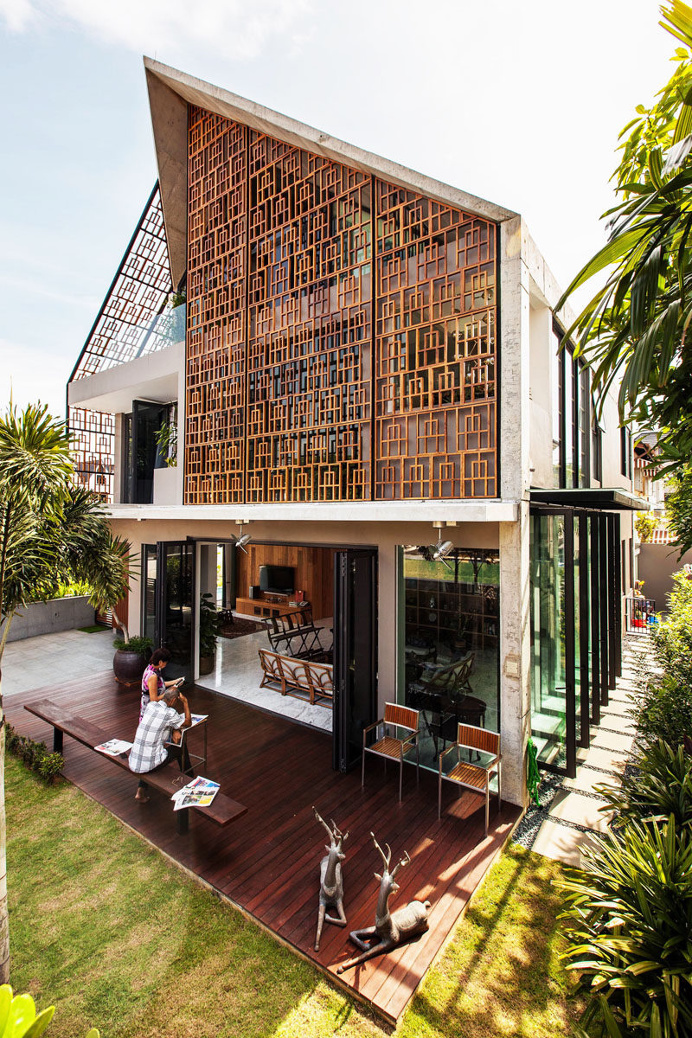 Teak Screens Provide Privacy, Natural Light, And Ventilation In This Home