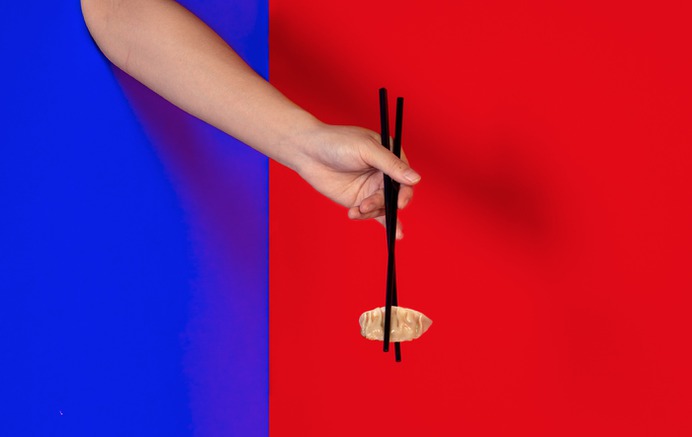 We were hired by a Toronto-based digital restaurant to create a brand identity, print and digital applications for their launch. The inspiration for the identity came from the story of the semi-historical Chinese monk, Budai, who allegedly lived in 10th century China. Hand holds chopsticks with dumplings