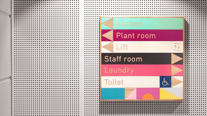 Stacked building blocks form signage for Sydney children's daycare