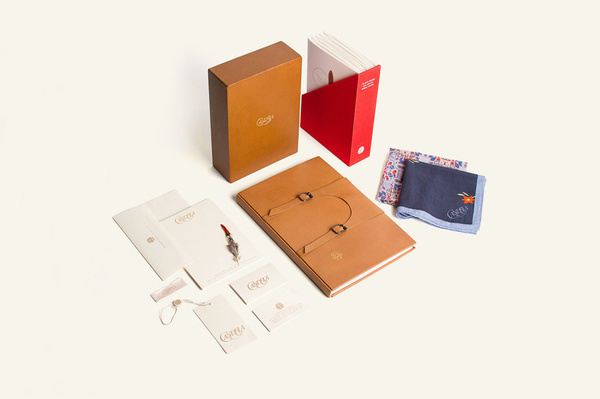 Logotype, stationery and tan leather packaging for footwear and fashion brand Candela designed by RoAndCo #logo #collateral #branding
