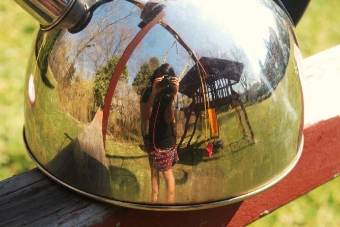 The Tea Kettle Adventures: Reflected Self-Portraits by Esha Biswas