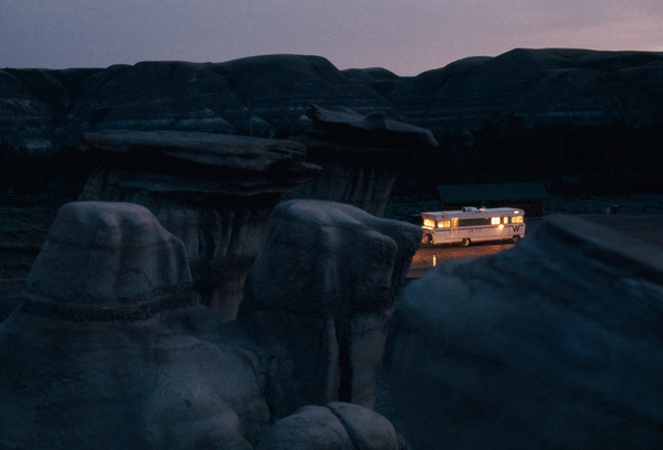 A mobile home shines amid eerie rock formations in Alberta, Canada, October 1970.Photograph by W.E. Garrett, National Geographic #formations #alberta #rock #home #nat #nature #mobile #vintage #film #geo #rv