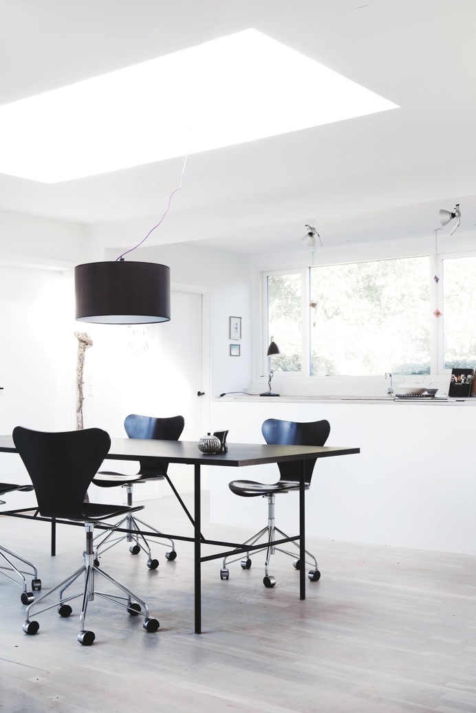Kitchen and dining area with skylight. Bang House by Norm.Architects. #normarchitects #diningroom #kitchen #skylight