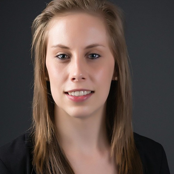 Professional Headshot of young woman in Sydney studio against grey background