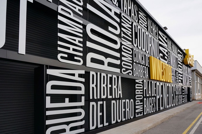Typographic signage for a liquor store - Mindsparkle Mag Pablo Rovalo from Singular Glass designed the typographic signage and placemaking project for Jané Winestore Expo-Licor, a liquor store in Barcelona. #logo #typography #identity #branding #design #color #photography #graphic #design #gallery #blog #project #mindsparkle #mag #beautiful #portfolio #designer
