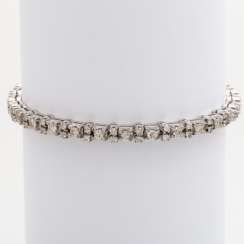 Bracelet set with sixteen square - cut diamonds