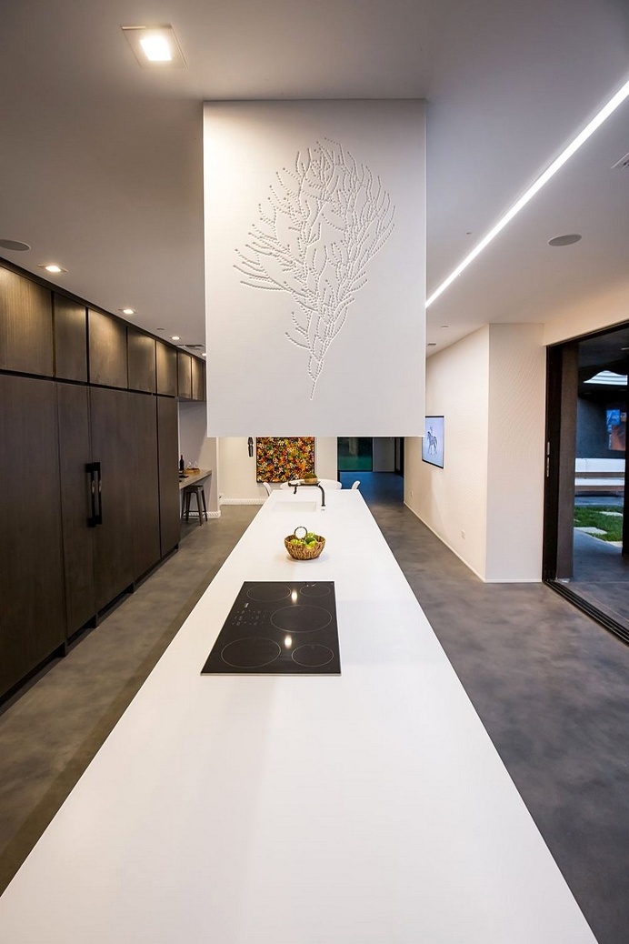 The Wave House by Mario Romano is Encased in White Aluminum