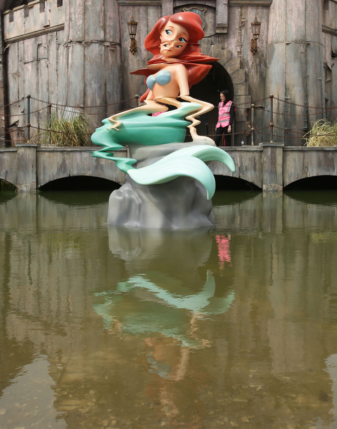 Banksy, Dismaland, sculpture, installation, Disney, water, mermaid, glitch, technology, satire