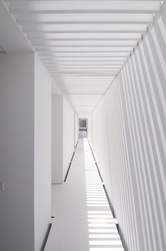Modern House in Paço de Arcos by Jorge Mealha corridor #interior #space #photography #light #shadow