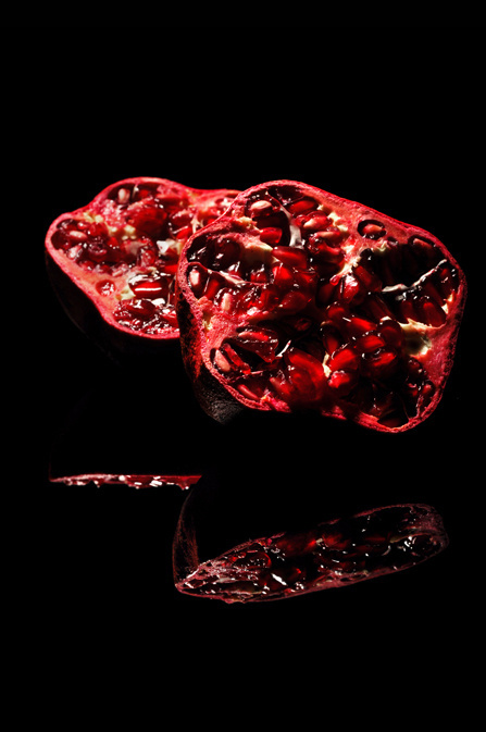 Juicy Pomegranate by Niermala B. Timmers www.niermalatimmers.com #timmers #red #pomegranate #fruit #black #mirror #photography #niermala #bouwina #still #life