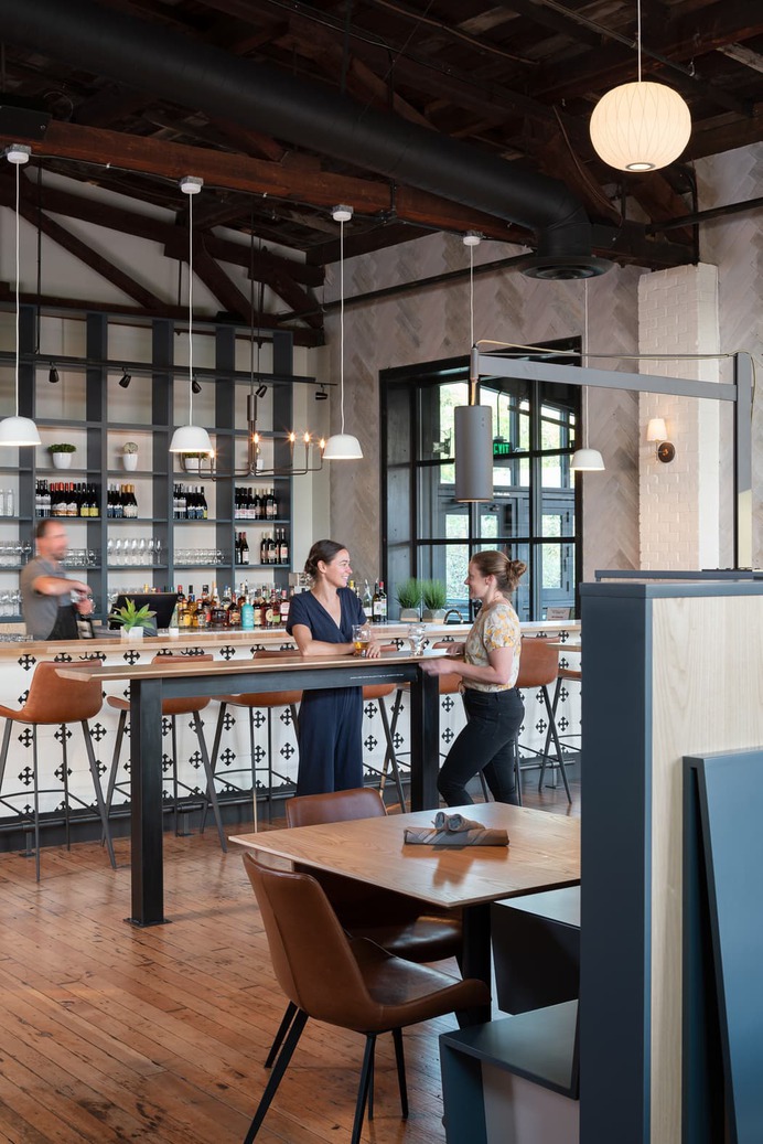 Graham Baba Architects Designs Sawyer, a Contemporary Seattle Restaurant Located in a Historic Canal-Front Sawmill