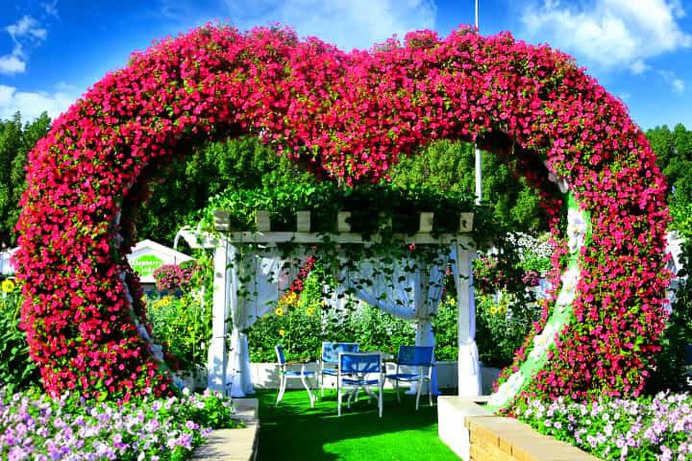 Hearts-shaped entrance arch for sitting areas of the Dubai Miracle Garden.