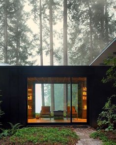 jim olson’s admiration for nature is expressed in the design of 'cabin at longbranch' nestled amidst the towering fir trees of an ancient forest in #washington. the living room’s large window frames views of the meadow and visually blends indoors and out. photo by kevin scott ⠀ ⠀ ⠀ see more #architecture by @olsonkundig on #designboom #olsonkundig