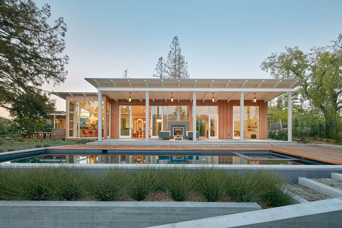 This wood clad and sloped roof modern house was designed for life in California's Silicon Valley