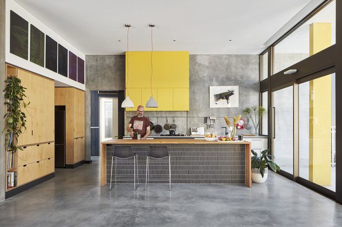 Coastal Suburban Home Featuring Bright, Vividly Colored Spaces 5