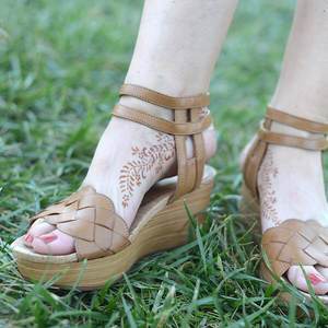 Ivy - Woman with henna tattoo on feet with sandals Floral henna designs are easy to create and especially fun to wear with Mihenna. We make sure you get perfect body art every time you use our sticker stencils.
