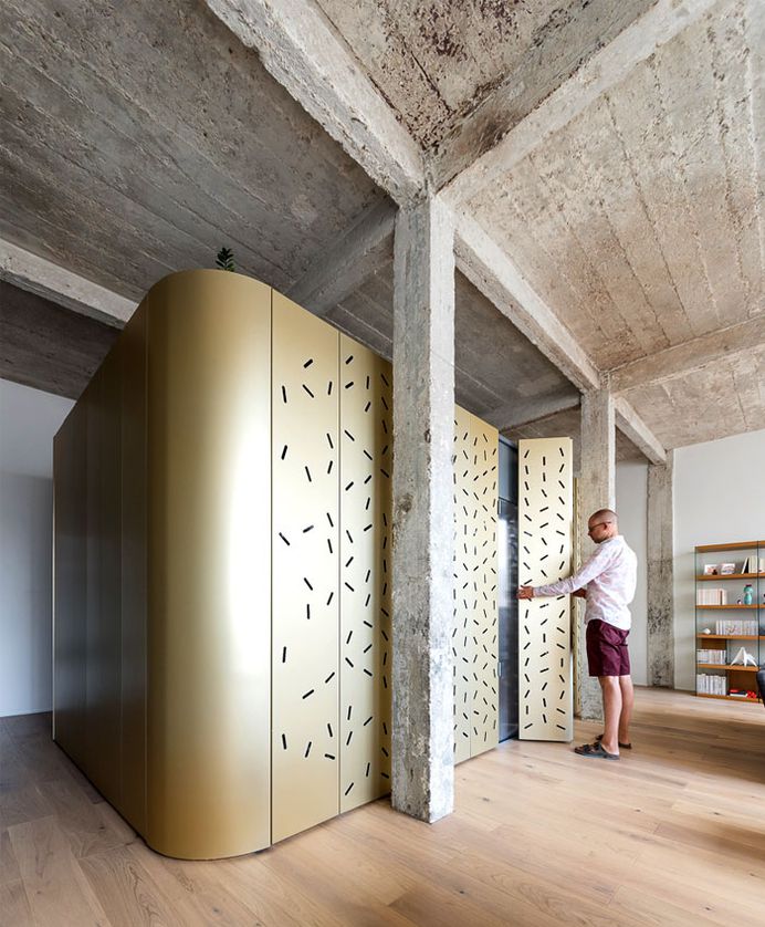 Perforated Aluminum Island at Parisian Apartment by SABO Project - InteriorZine