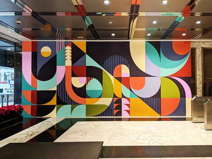 Artist Duo Brings Life Into A Boring Old Stairway By Painting A Bright And Colorful Rug-Shaped Mural