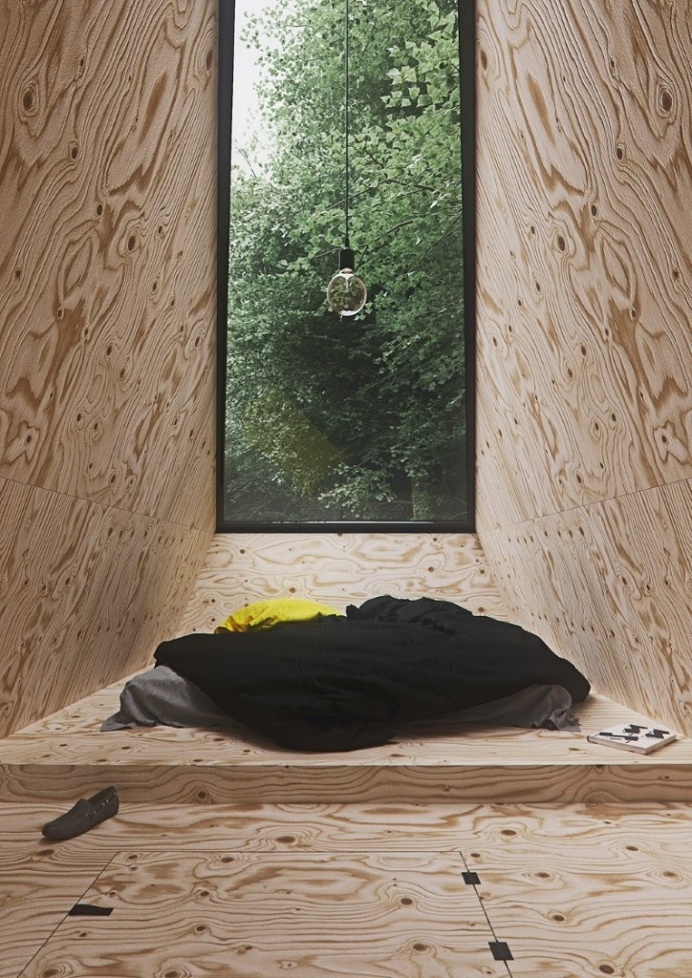 Cabin in a forest with minimal impact on the environment